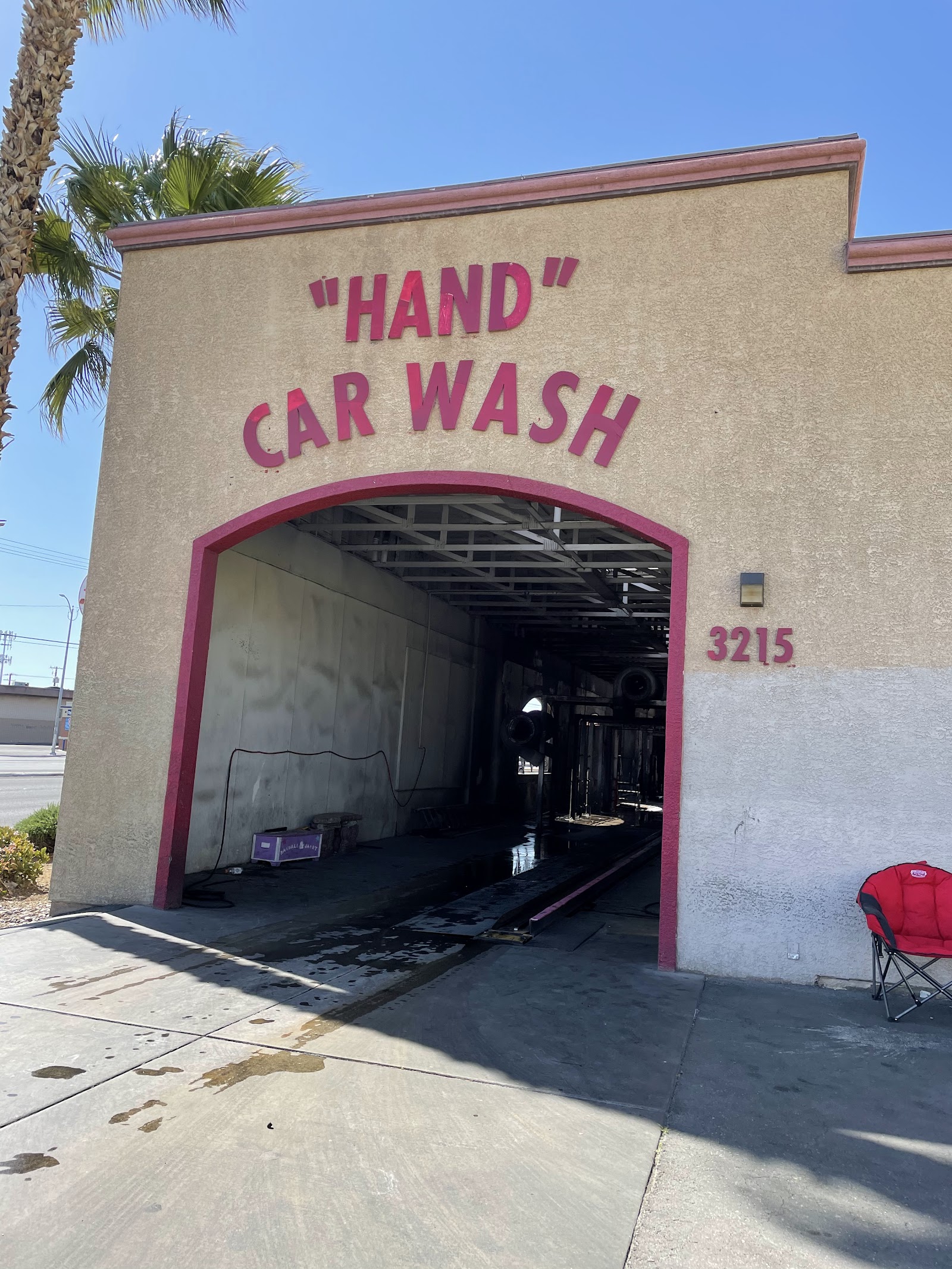 Exterior of the Las Vegas Auto Spa hand car wash building with red lettering at 3215 S Lamb Blvd